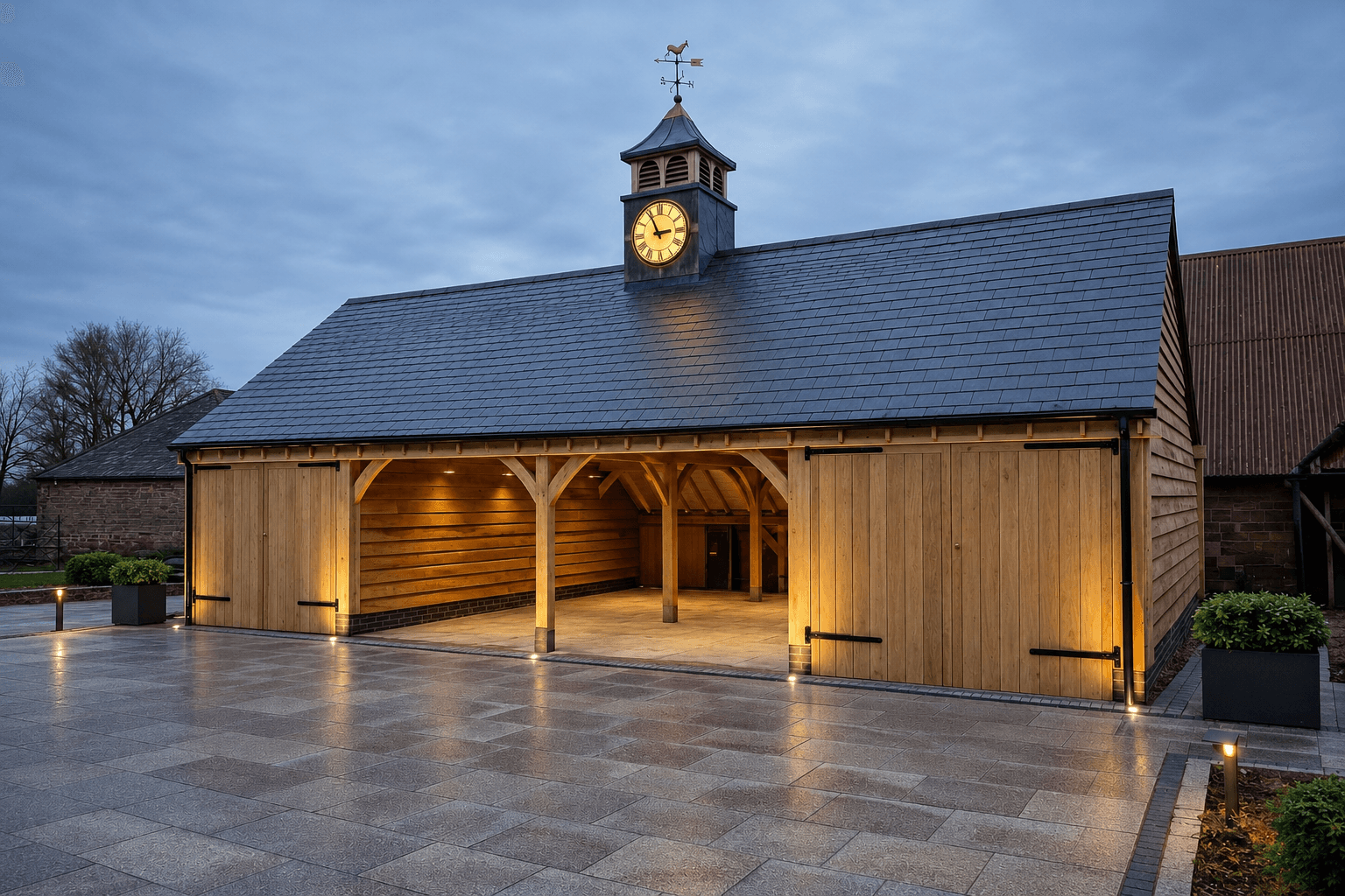 Multi-bay oak frame garage in a rural setting