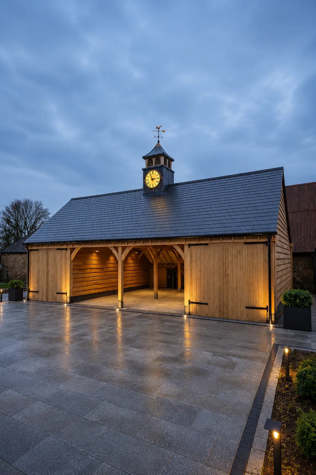 Multi-bay oak frame garage in a rural setting